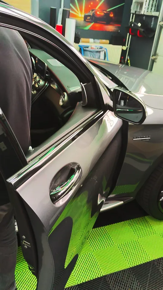 Mercedes-AMG GLC before the chrome delete – chrome window trims and door handle on the driver's door