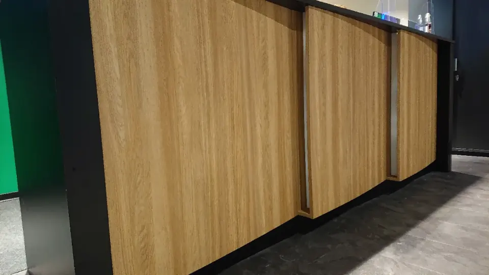 Wrapped company information stand with furniture film